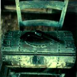 Chest Sitting on Chair